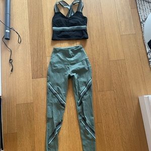 Black and green beyond yoga workout set with mesh detail size XS